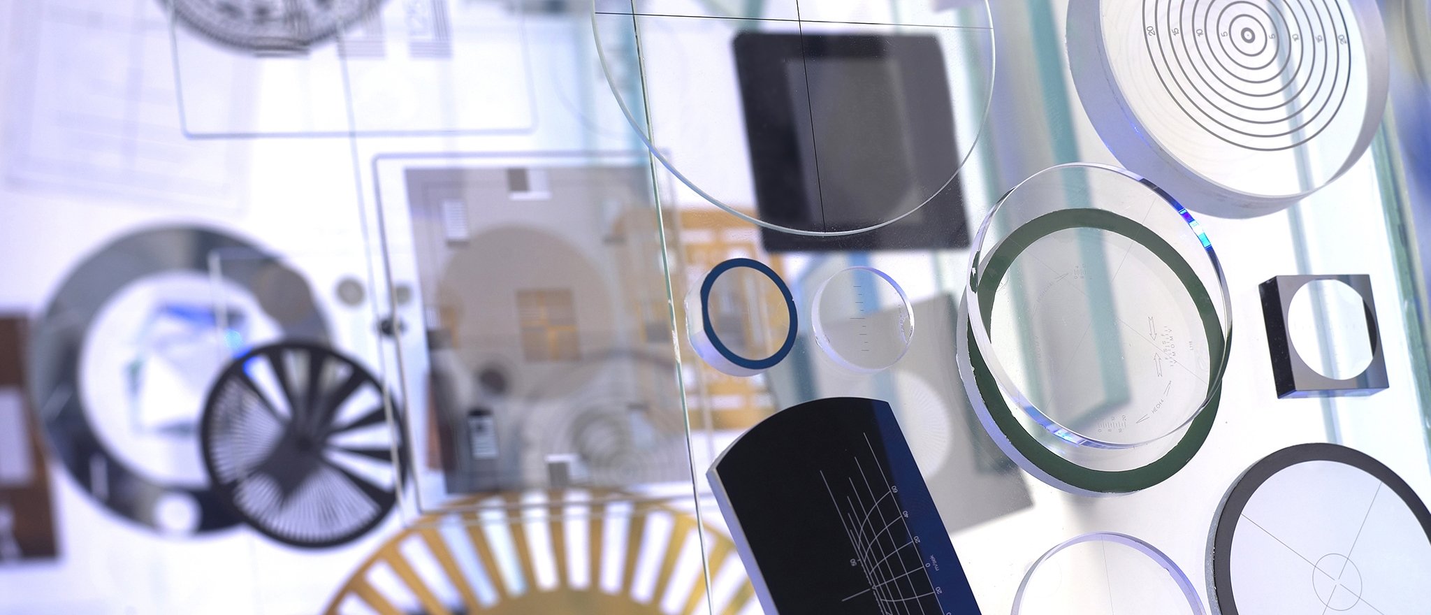 Manufacturer of Reticles and Precision Photolithographic Products on Glass, Film and in Metal Foil